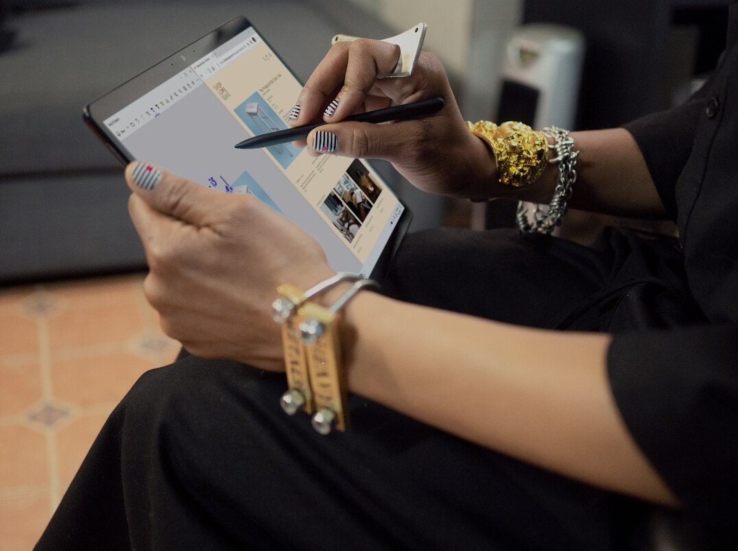 woman using tablet for documents